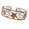 Original signed Krementz 14k gold and rose gold filled floral cuff (Circa 1960s).