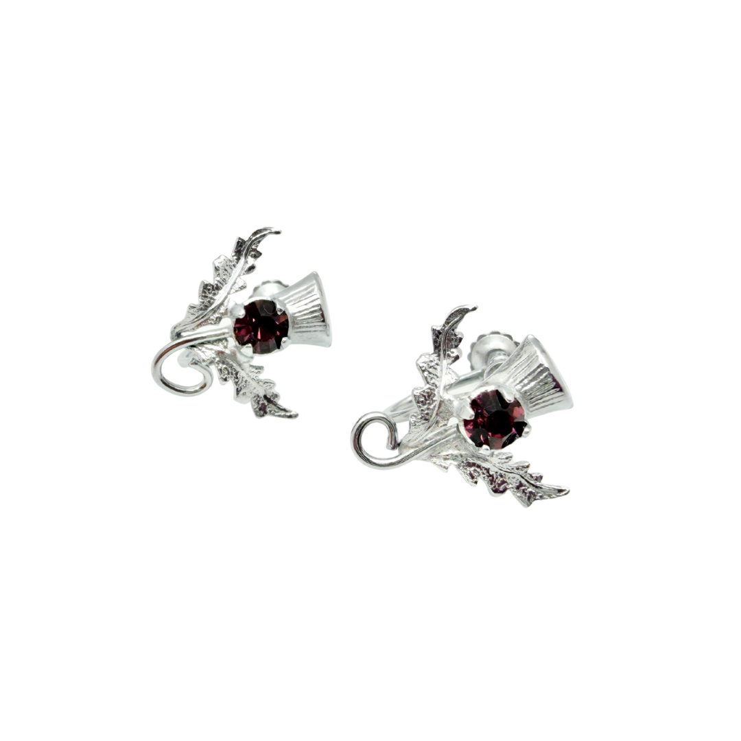 Vintage 1950s Quarrier and Ward silver-tone Scottish thistle screw-back earrings with inset amethyst stone. Marked W Bros Mizpah. Made in Scotland.