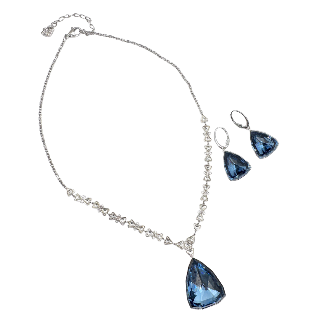 Genuine rhodium plated denim blue Austrian Swarovski crystal pendant necklace and earring set. 