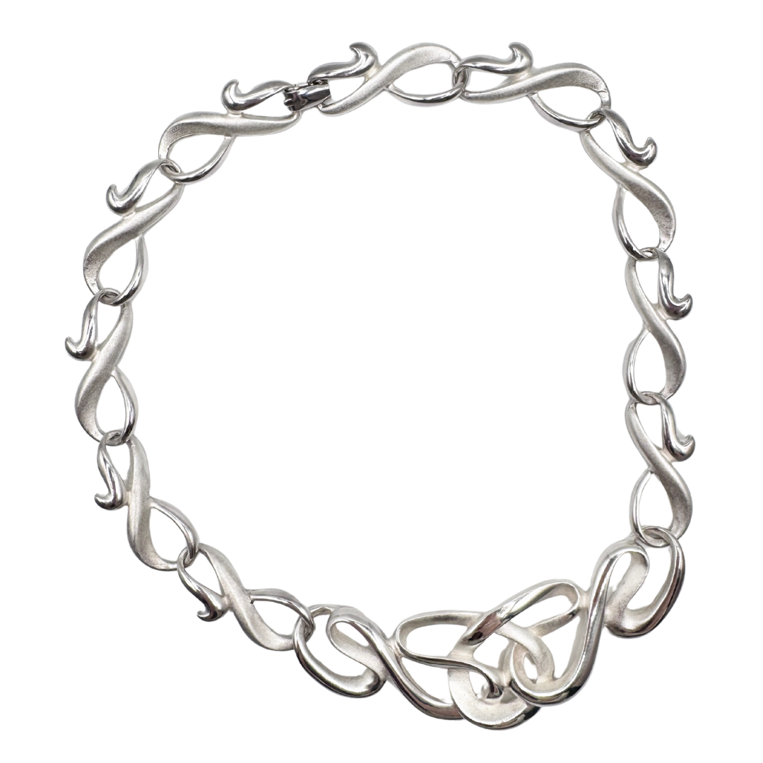 Signed P.E.P. (Erwin Pearl) Silver spiral link statement necklace (Circa 1980s).