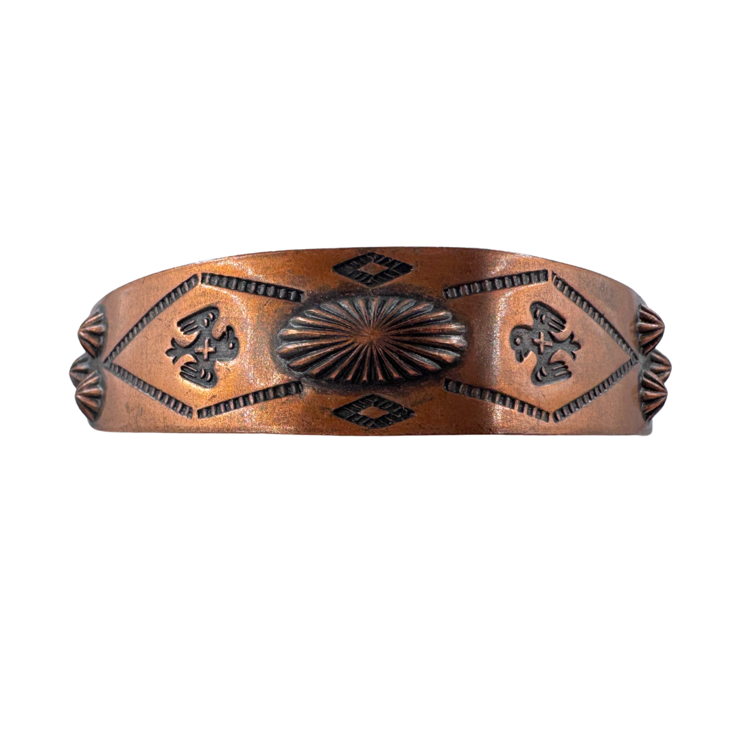 Vintage Bell Trading Post unmarked stamped copper thunderbird cuff bracelet.