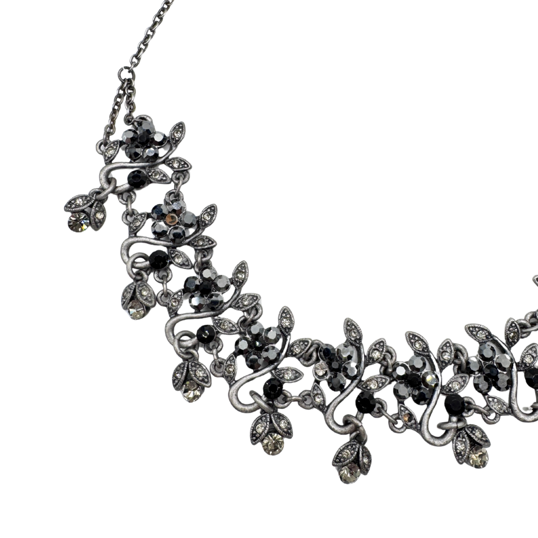 Floral faux hematite and rhinestone silver statement necklace