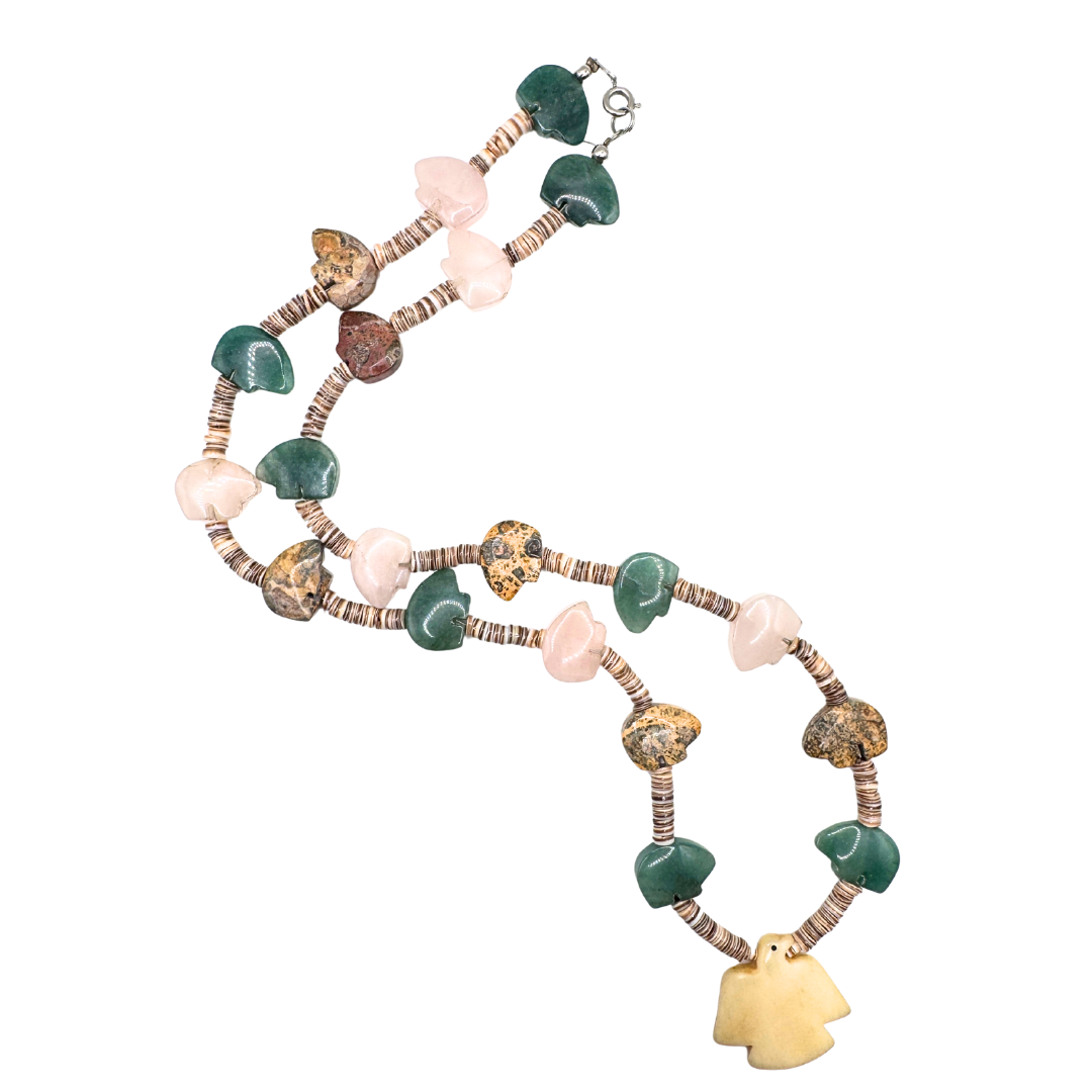 Hand carved bone eagle pedant on a single strand of shell heishi beads spaced by rose quartz, jade and jasper stone bear beads. 
