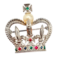 A rare vintage Marcel Boucher jewelled crown brooch, silver-tone featuring red, blue and green jewel-tone rhinestones and a single mabe pearl. Dated between 1944 and 1949.