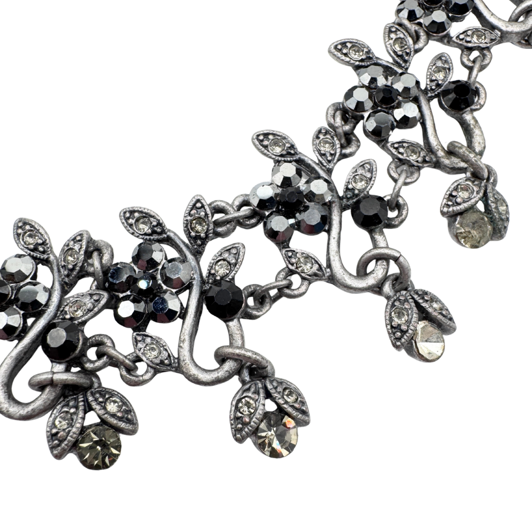 Floral faux hematite and rhinestone silver statement necklace